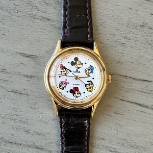 Gold and Black Disney Character Watch